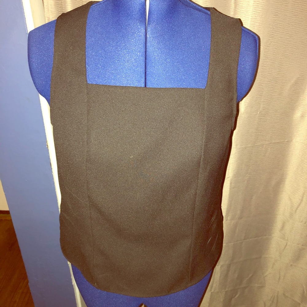 Women black sleeveless blouse